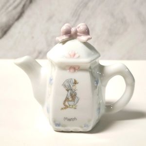 Precious moments March teapot figurine